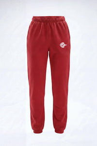 Red sweatpants with an elastic waistband and cuffs, featuring a small white logo on the upper right hip, displayed against a light gray background.