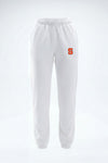 White sweatpants with an orange embroidered letter 'S' on the left hip, shown against a plain white background.