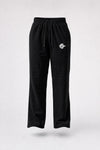Black sweatpants with an elastic waistband, drawstring, and a small white embroidered logo on the left thigh, shown against a light gray background.