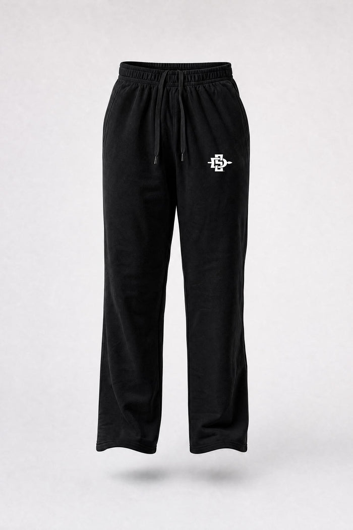 Black sweatpants with an elastic waistband, drawstring, and a small white embroidered logo on the left thigh, shown against a light gray background.