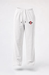 White sweatpants with an elastic waistband and drawstring, featuring a small red and black graphic logo on the left thigh, shown against a light gray background.