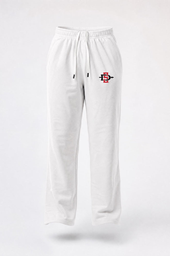 White sweatpants with an elastic waistband and drawstring, featuring a small red and black graphic logo on the left thigh, shown against a light gray background.