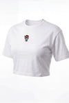 A white short-sleeve cropped t-shirt featuring a small graphic  on the left chest, displayed against a plain white background.