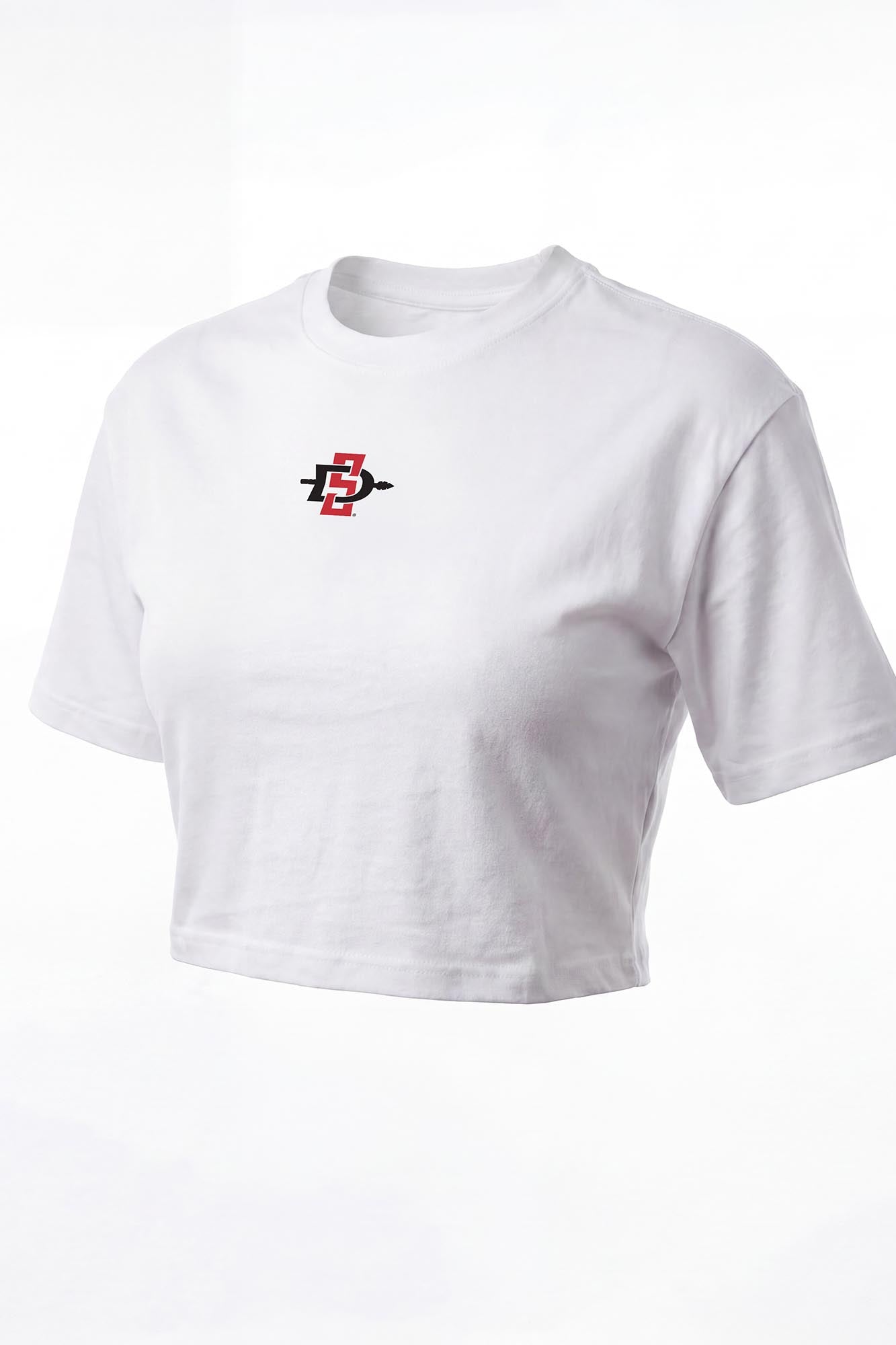 A white short-sleeve cropped t-shirt with a small red and black graphic logo on the left chest, displayed on a clean white background.