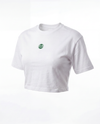 A white short-sleeve crop top t-shirt with a small green circular logo on the left chest, displayed on a clean white background.