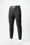 Dark charcoal gray heather sweatpants with a white drawstring and a small red Indiana University 'IU' logo on the left hip, shown against a plain white background.
