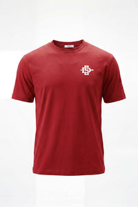 A red short-sleeve crewneck t-shirt with a small white cross logo containing the letters 'SDSU' on the left chest, displayed on a clean white background.