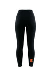 Black high-waisted leggings with a small orange letter 'S' logo on the lower left leg, shown against a plain white background.