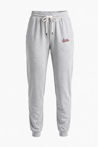 Light gray heather sweatpants with a white drawstring and a small red embroidered logo on the left hip, shown against a plain white background.
