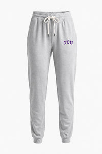Light heather gray sweatpants with a white drawstring and purple 'TCU' lettering on the left hip, shown against a plain white background.