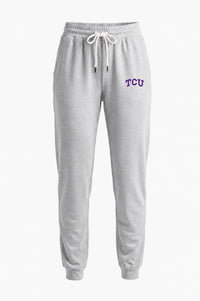 Light heather gray sweatpants with a white drawstring and purple 'TCU' lettering on the left hip, shown against a plain white background.