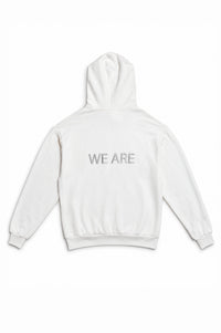 A white pullover hoodie shown from the back, featuring the text 'WE ARE' printed in a light gray sans-serif font across the upper back.